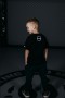 Tričko Octagon v černém provedení, na přední straně velké logo Octagon Fight Wear a malé logo vzadu u krku.